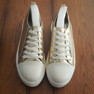 Gold sneakers never worn